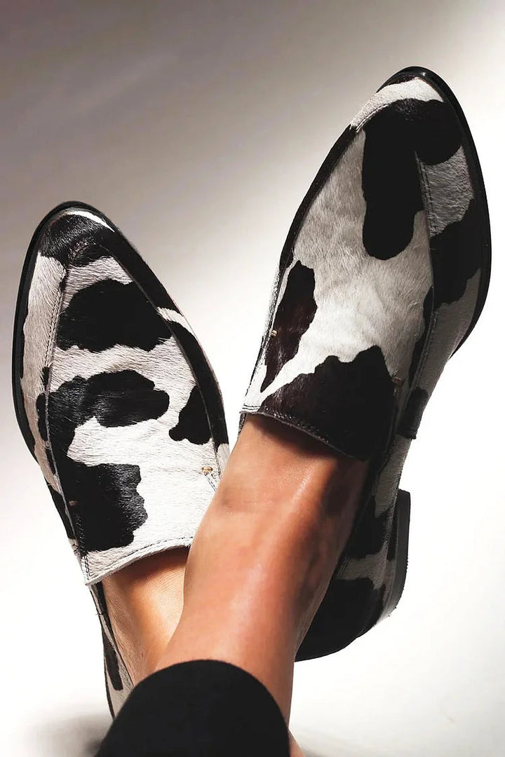 Karen Moree | Cow Print Slip-Ons
