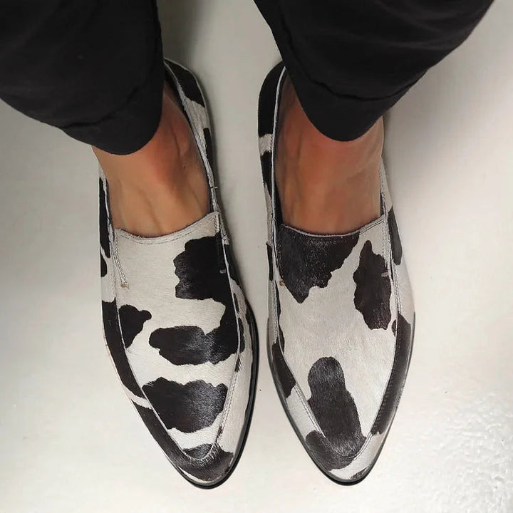 Karen Moree | Cow Print Slip-Ons